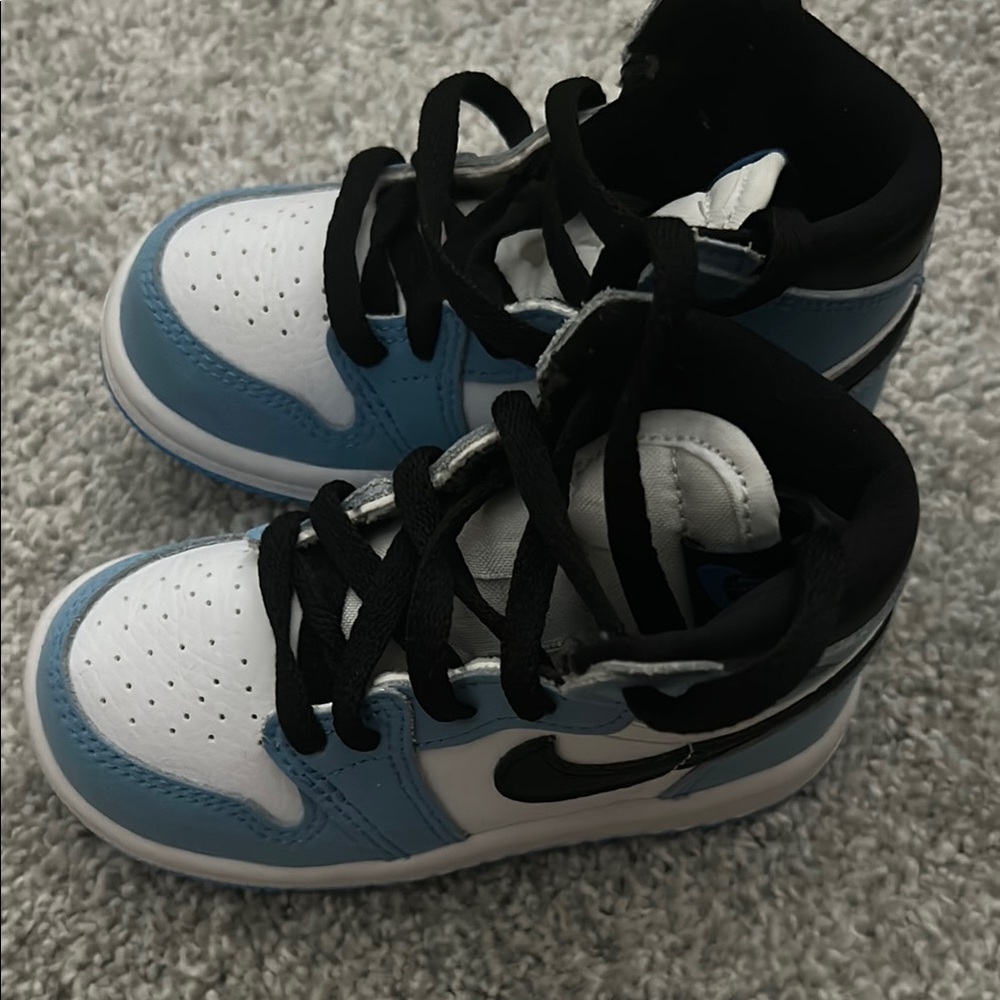 Nike Blue and White Sneakers with Classic Design